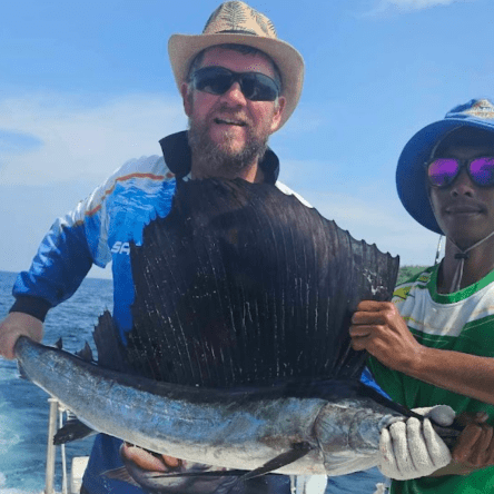 Big Game 2 - Trolling and bottom fishing at Racha Yai and Racha Noi Islands, catch sailish, barracuda, tuna, mackerel. Private charter fishing.