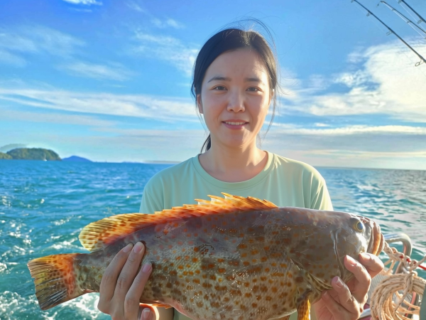 private_charter_fishing_coral_island_women_grouper